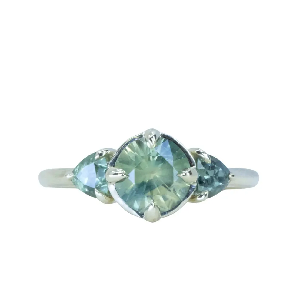 1.28ct Round Parti Teal Green Untreated Montana Sapphire and Trillion Parti Sapphire Low Profile Ring in 14k Green Gold