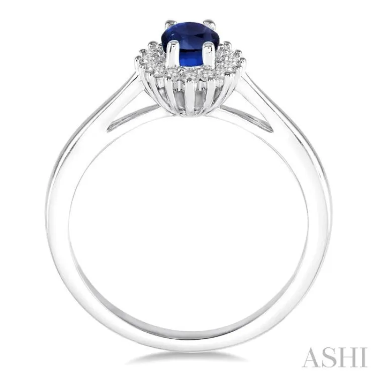 6X4 MM Oval Cut Sapphire Center and 1/8 Ctw Round Cut Diamond Halo Precious Stone Ring in 10K White Gold