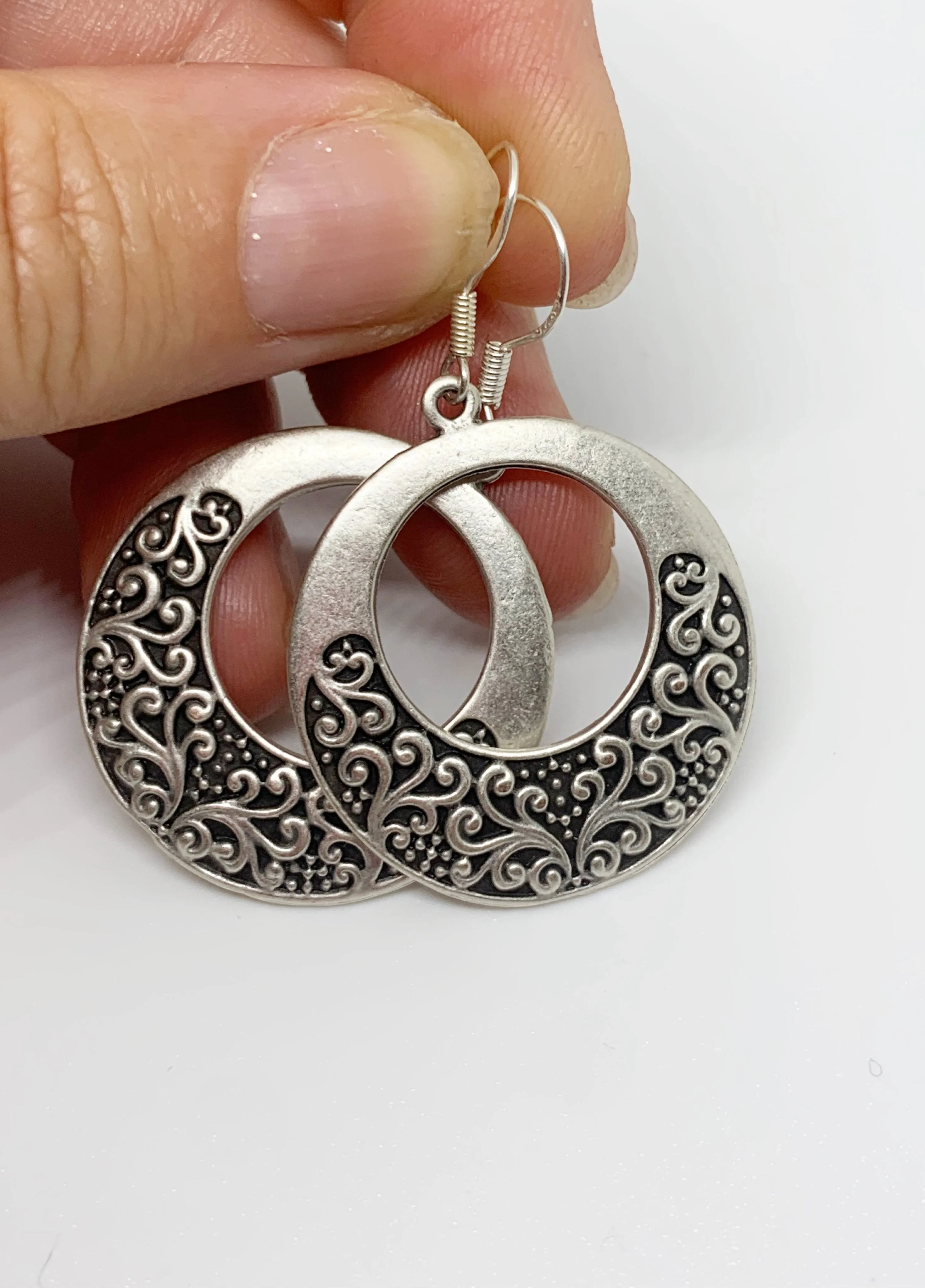 Filigree hearts. Sterling silver hoop earrings, jewelry.