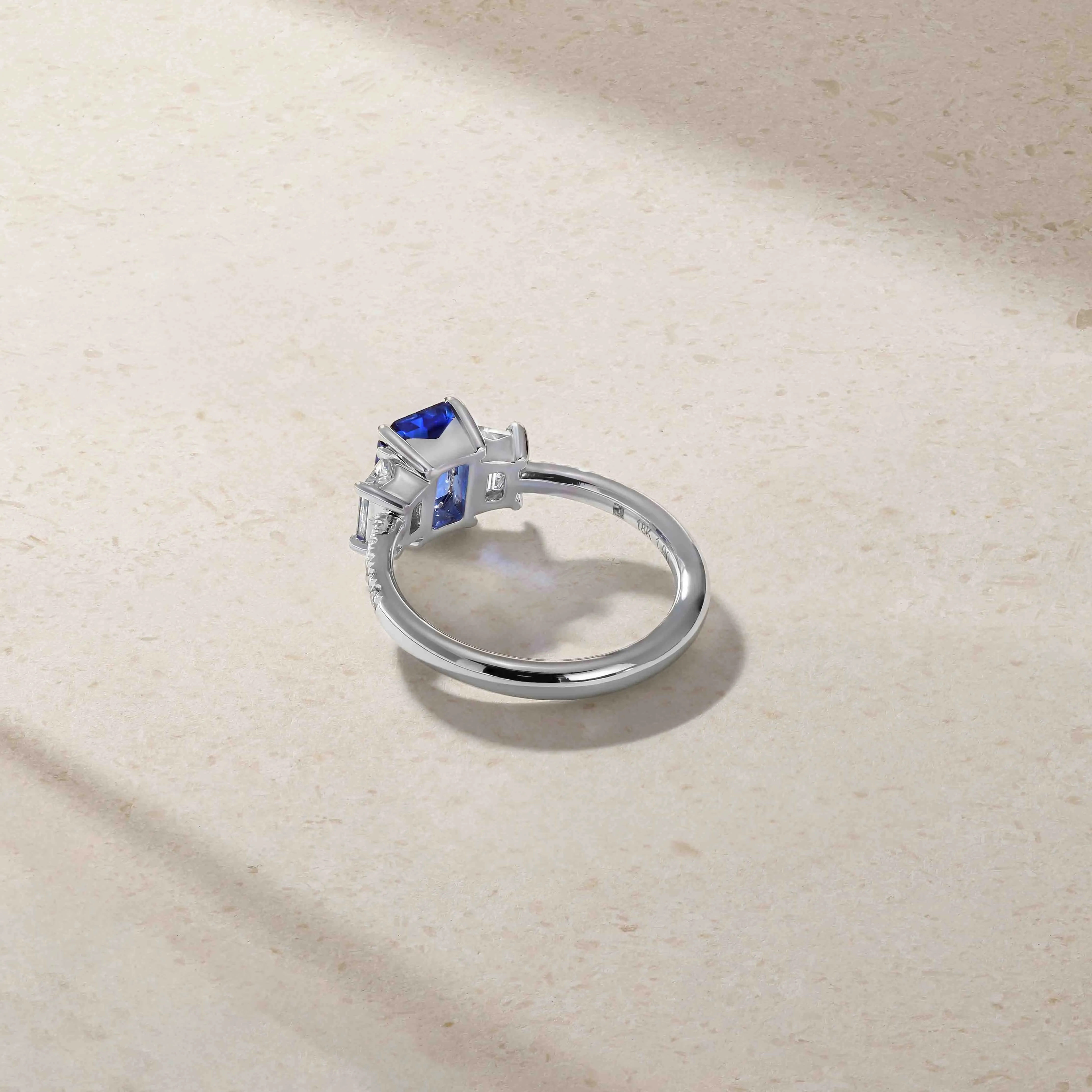 Nouveau Three Stone Emerald Cut Sapphire and Diamond Ring