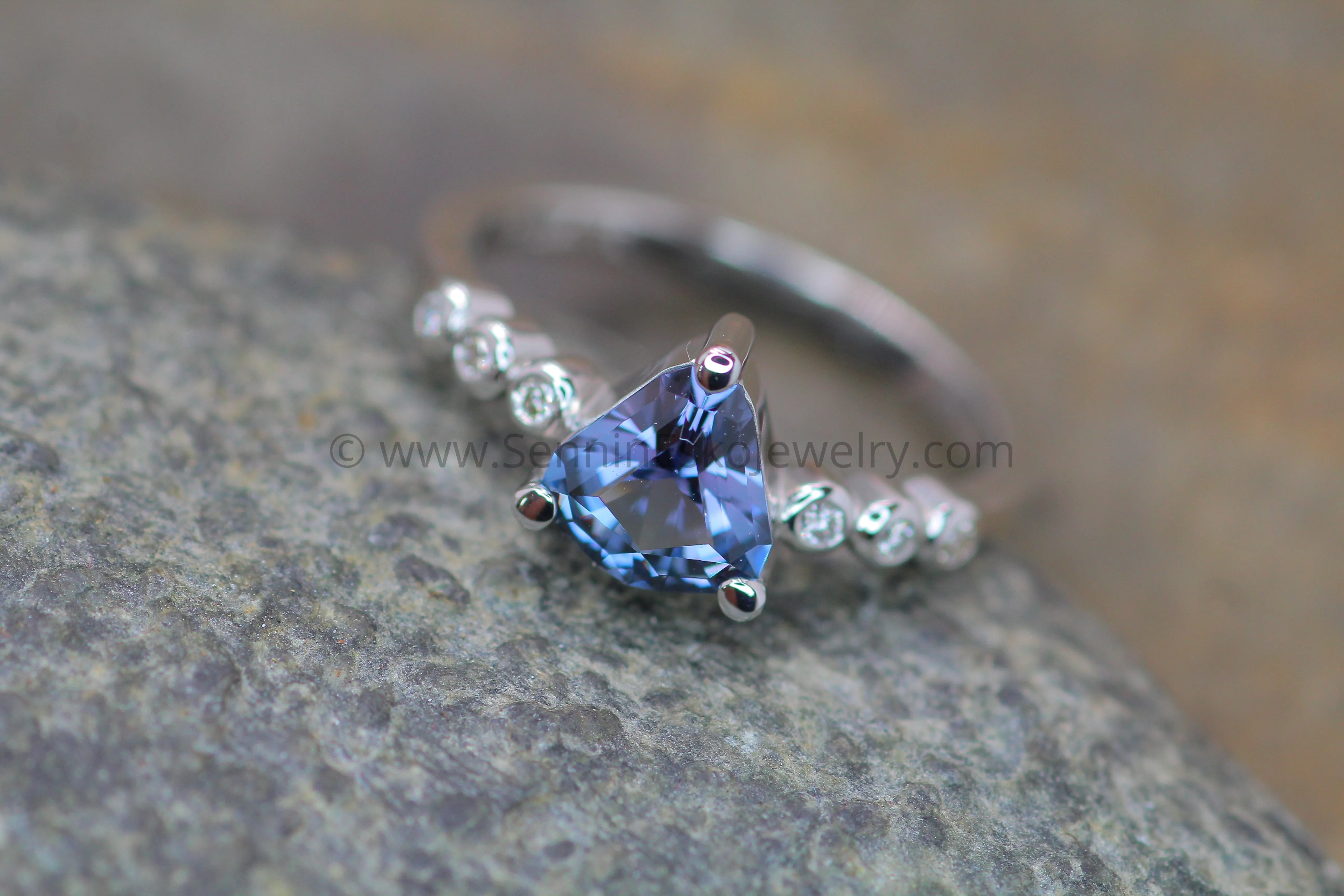 Seven Stone Diamond Accented Prong Setting - Depicted with a Lilac Spinel (Setting Only, Center Stone Sold Separately)